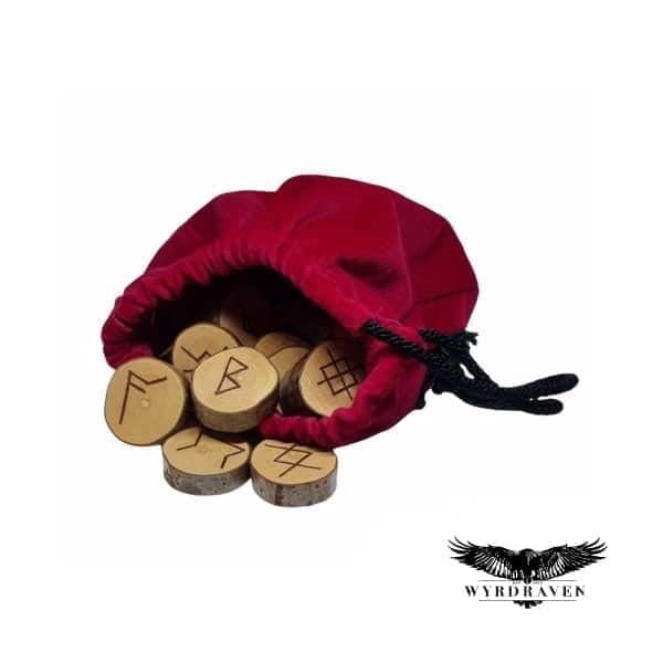 Anglo Saxon Hazel Runes falling out of a red velvet pouch - Viking Runes - Wyrdraven Runes - wyrdraven.co.uk